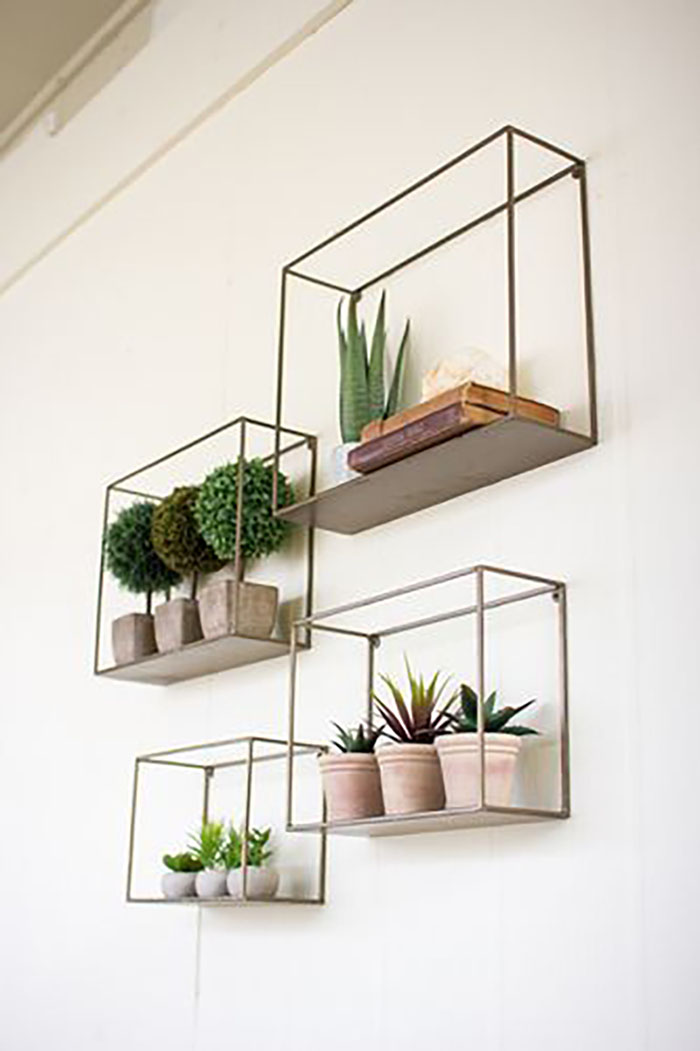 I love these kind of shelves, they look amazing with small potted plants.