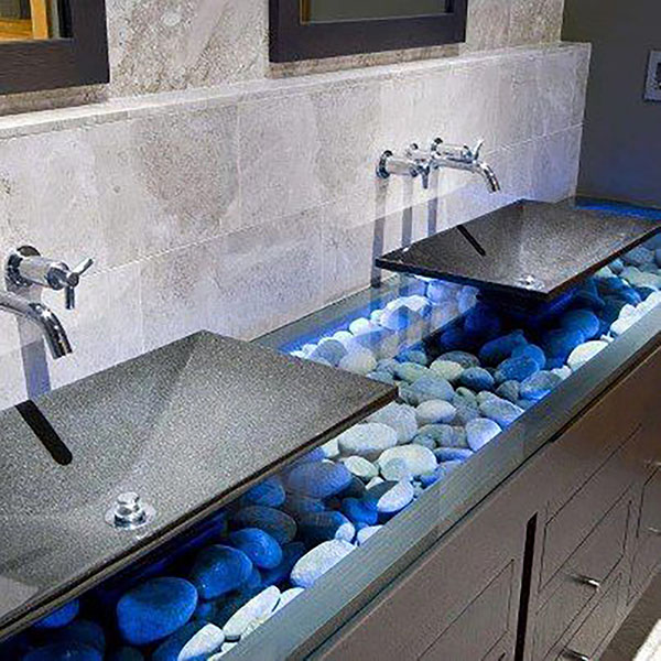 This looks great with the blue lighting and I like the design of the dark grey sink.
