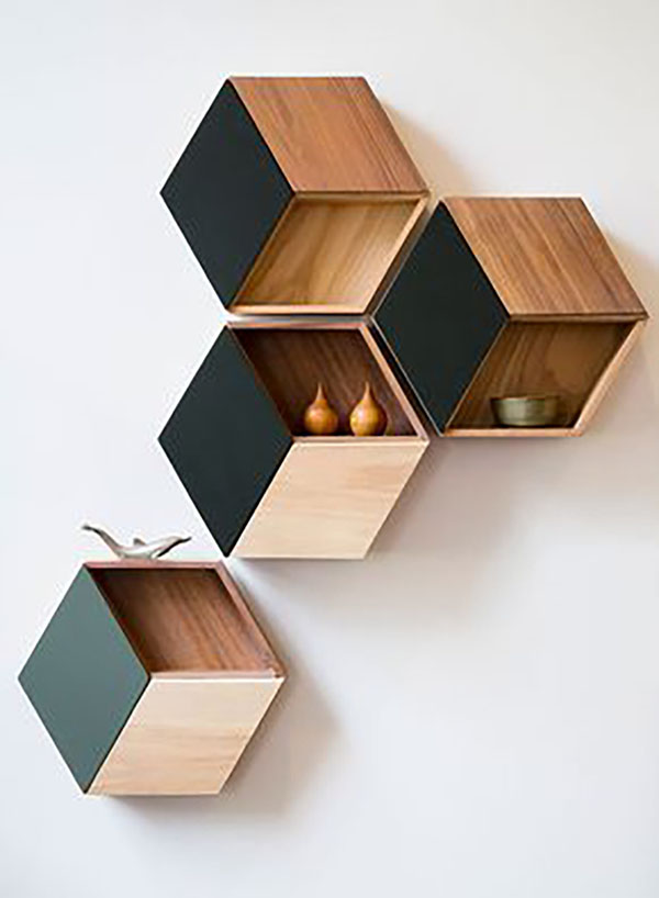 I love this hexagonal shelf, which is partly closed. Wood and green materials are used, they look amazing.
